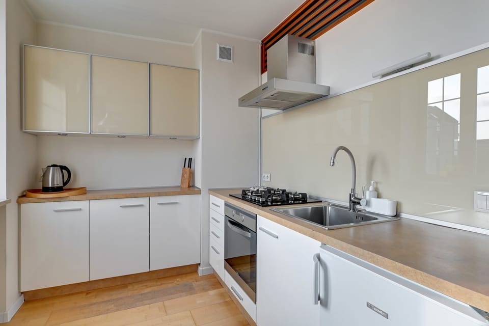 The kitchenette's practical layout maximizes space and functionality.