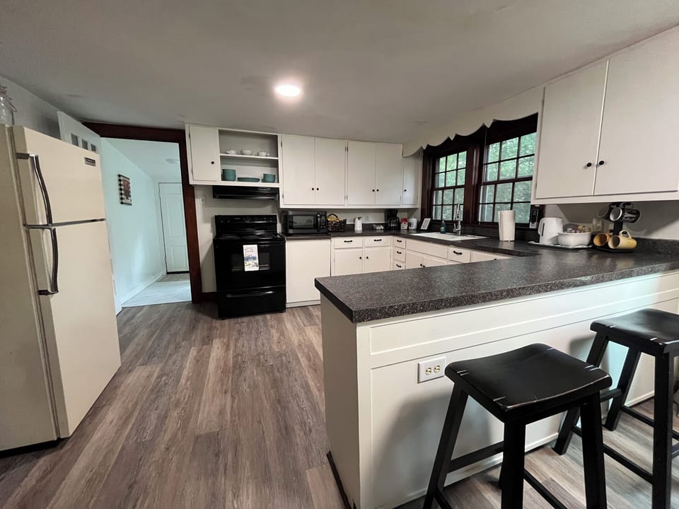 Spacious kitchen with eating bar