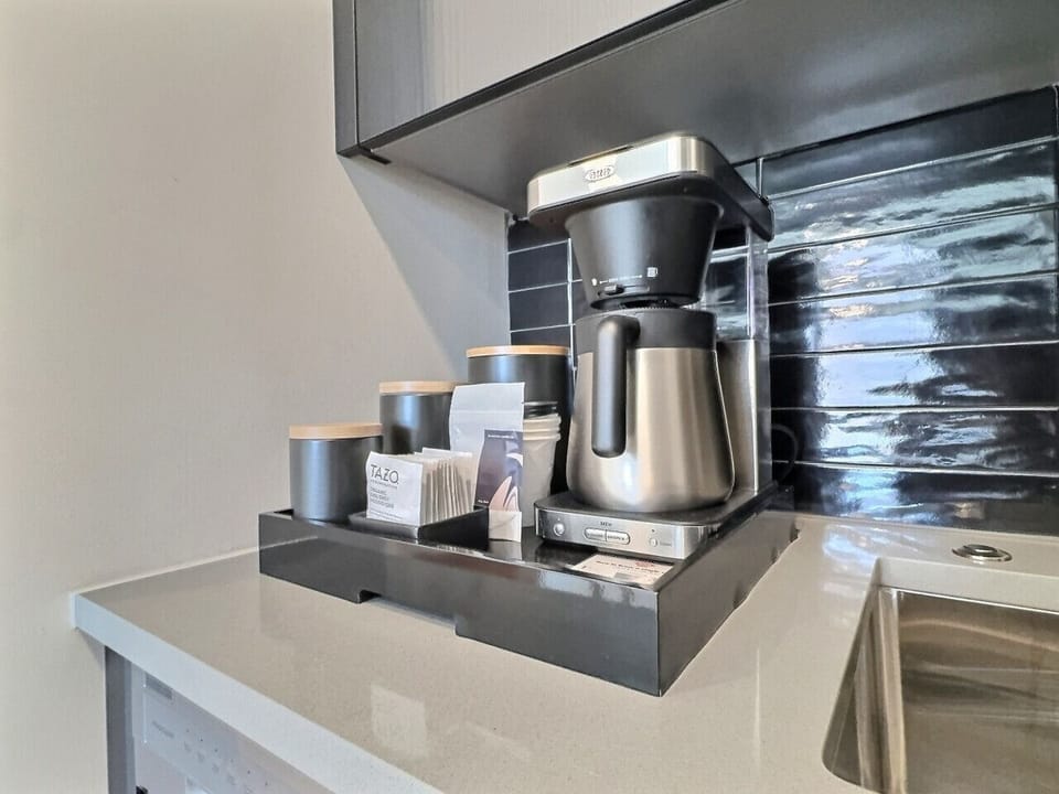 Fresh coffee anytime in the comfort of your room, perfect for a short-term rental.