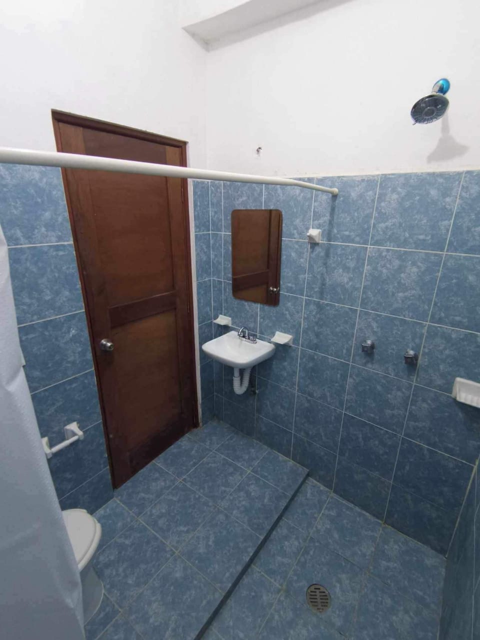 Basic Room, 2 Queen Beds, Air conditioning | Bathroom | Shower, towels, soap, shampoo