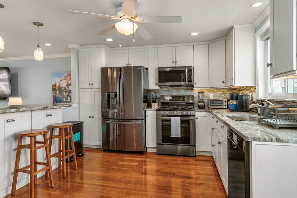 Out spacious kitchen also includes an eat in breakfast bar.