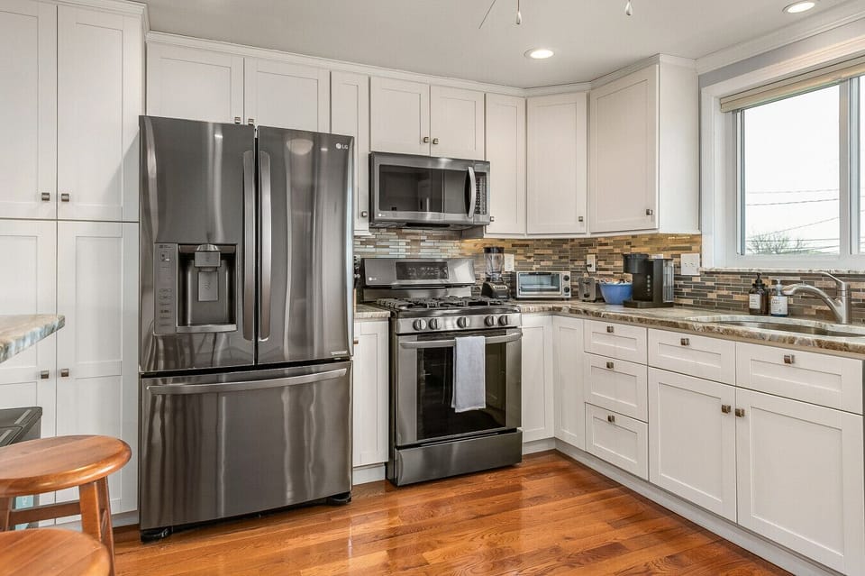 Updated and fully stocked kitchen! has everything from spices to blenders & more!