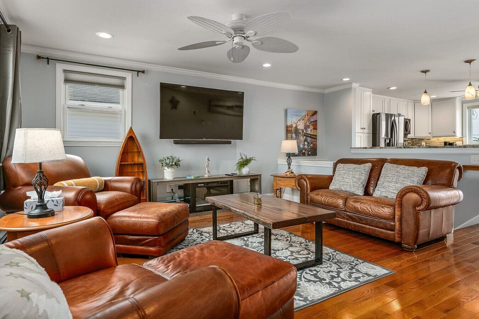 Our spacious living room with mini-split cooling and heating for a comfortable place to hang out during your stay! Smart 55 inch TV and soundbar to keep the entertainment rolling all day