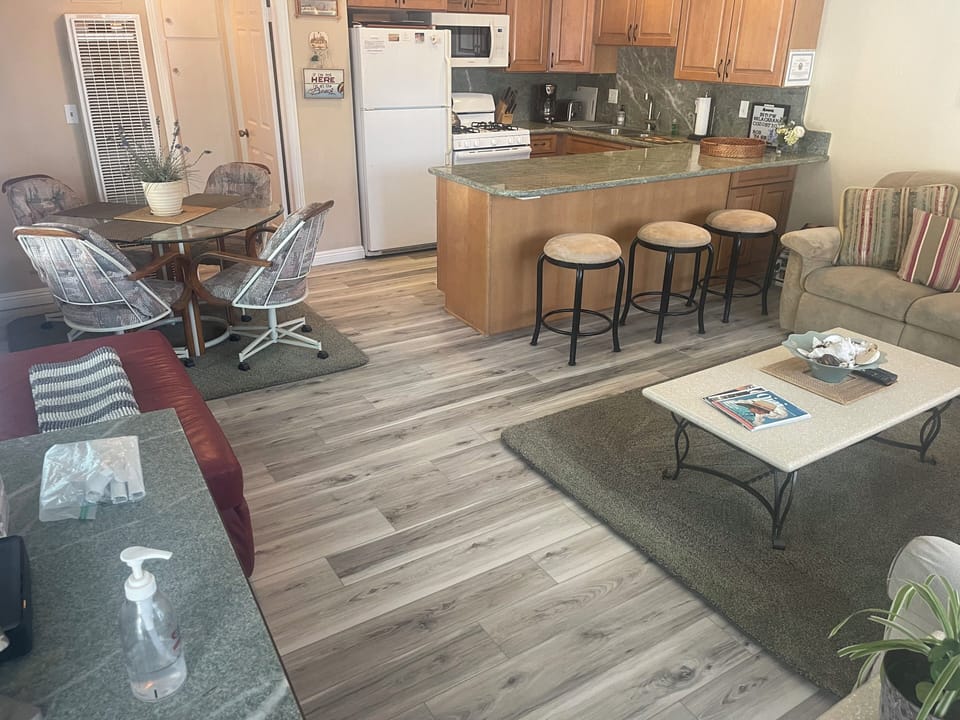 Kitchen with eating area and bar stool area