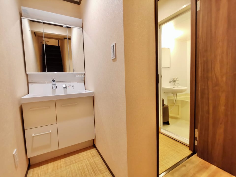 Combined shower/tub, bidet, soap, shampoo