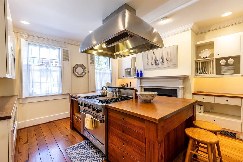 The high-end stainless steel appliances in the the kitchen are ideal for the master chef of the family.