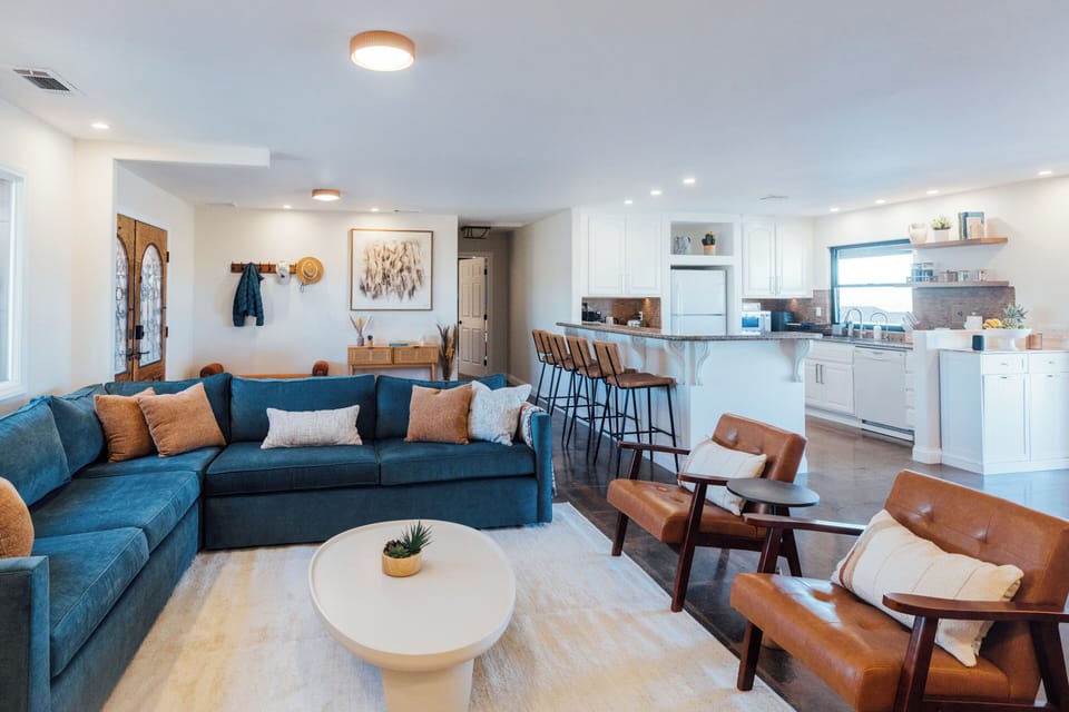 Open-plan living room with plenty of comfy seating for everyone.