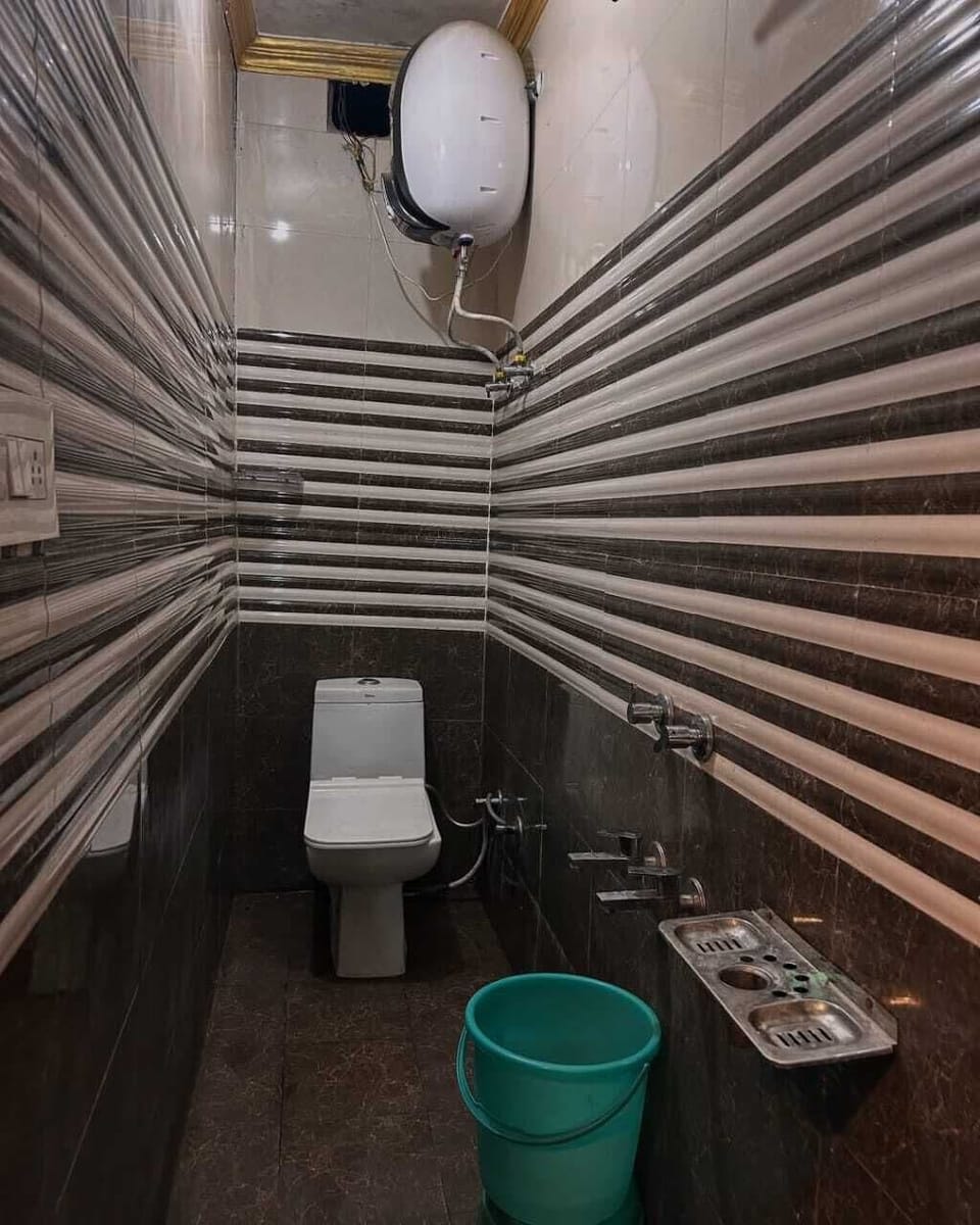 Quadruple Room | Bathroom | Shower, soap