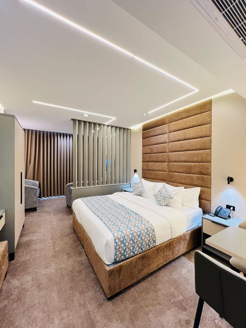 Signature Double Room, City View | In-room safe, desk, laptop workspace, blackout drapes
