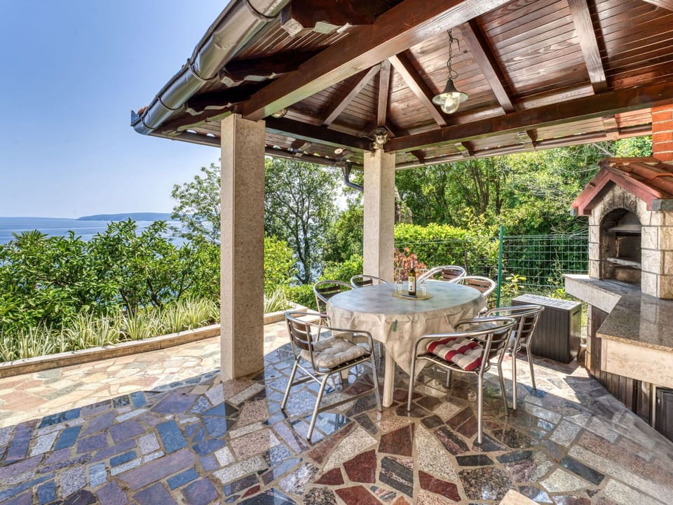 Shade, Chair, Resort, Garden, Eco Hotel, Outdoor Structure, Flagstone, Patio, Houseplant, Outdoor Furniture
