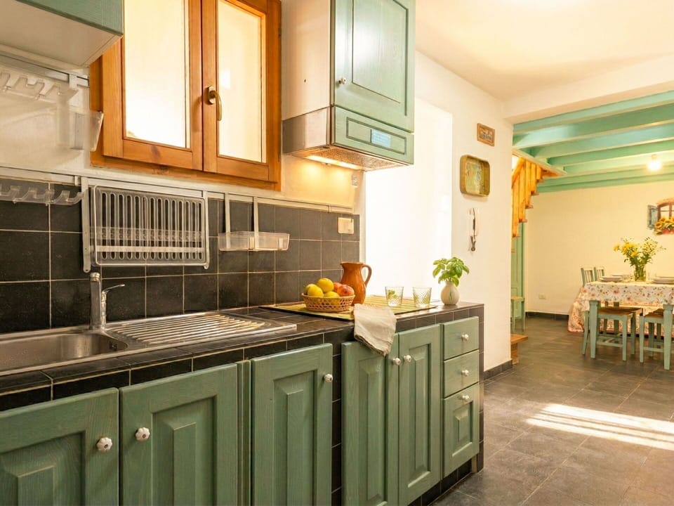Kitchen, Interior Design, Countertop, Furniture, Cabinetry, Flooring, Wood, Ceiling, Kitchen Appliance, Floor