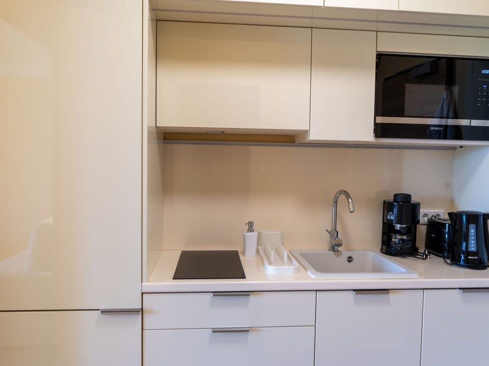 Kitchen, Countertop, Kitchen Appliance, Cabinetry, Interior Design, Major Appliance, Kitchen Sink, Sink, Flooring, Tap