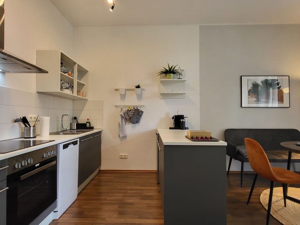 Furniture, Interior Design, Flooring, Floor, Kitchen Appliance, Wood, Cabinetry, Ceiling, Room, Kitchen