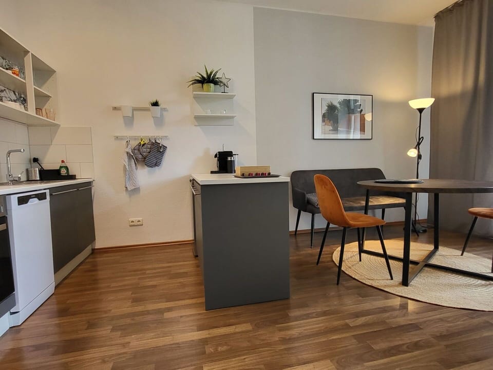 Furniture, Flooring, Interior Design, Floor, Wood, Wood Flooring, Room, Lighting, Chair, Ceiling