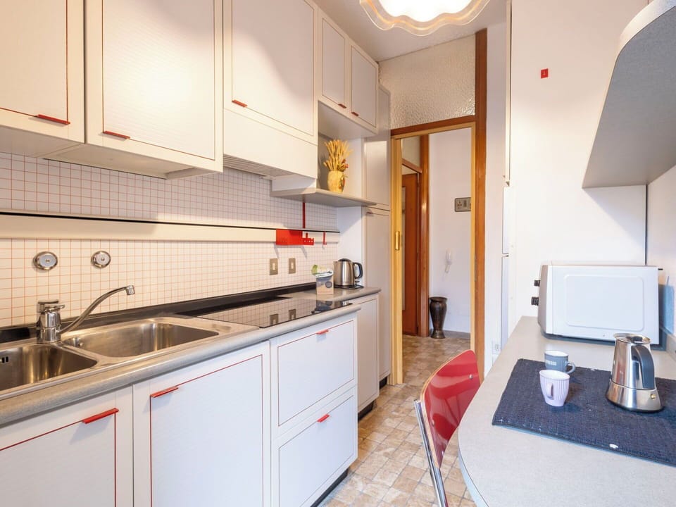 Kitchen, Countertop, Wood, Flooring, Interior Design, Major Appliance, Kitchen Appliance, Floor, Kitchen Sink, Cabinetry