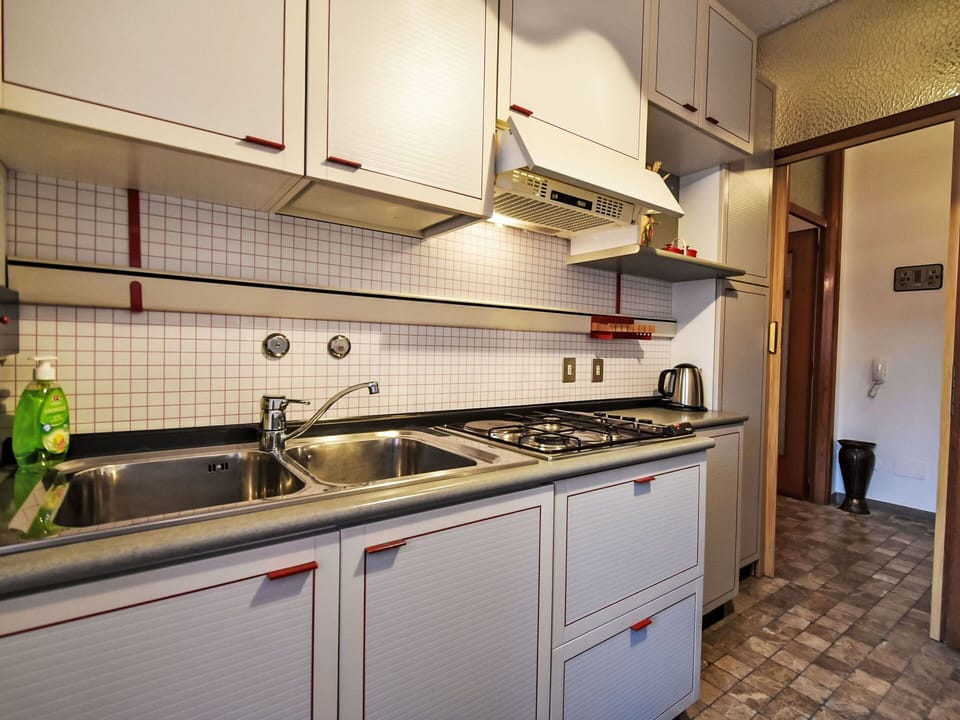 Kitchen, Major Appliance, Kitchen Sink, Countertop, Kitchen Appliance, Plumbing Fixture, Interior Design, Kitchen Stove, Plumbing, Sink