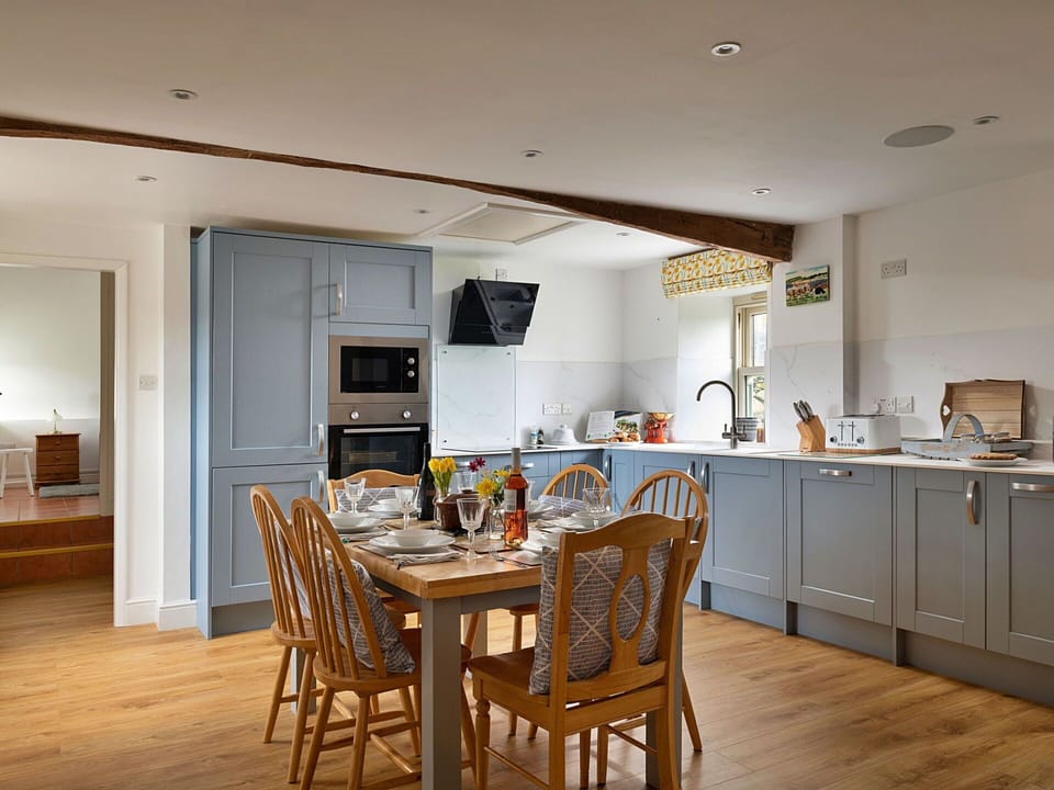 Furniture, Interior Design, Kitchen, Flooring, Countertop, Wood, Cabinetry, Ceiling, Kitchen Appliance, Floor