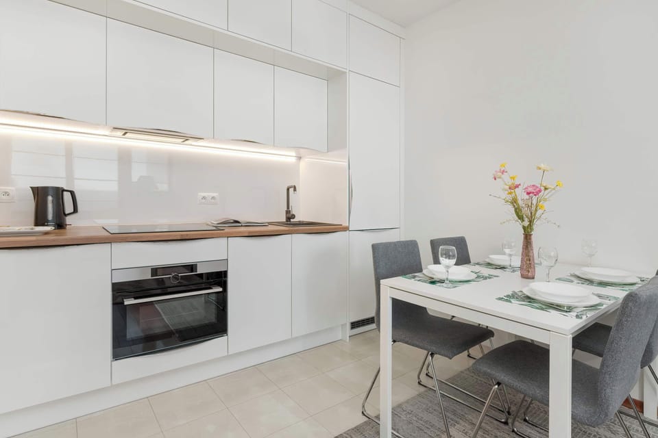 The fully equipped kitchenette includes everything you need for a home-cooked meal.