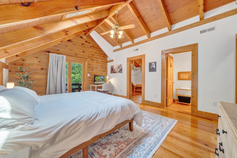 Master bedroom with extra bedding, dressers and a walk in closet!