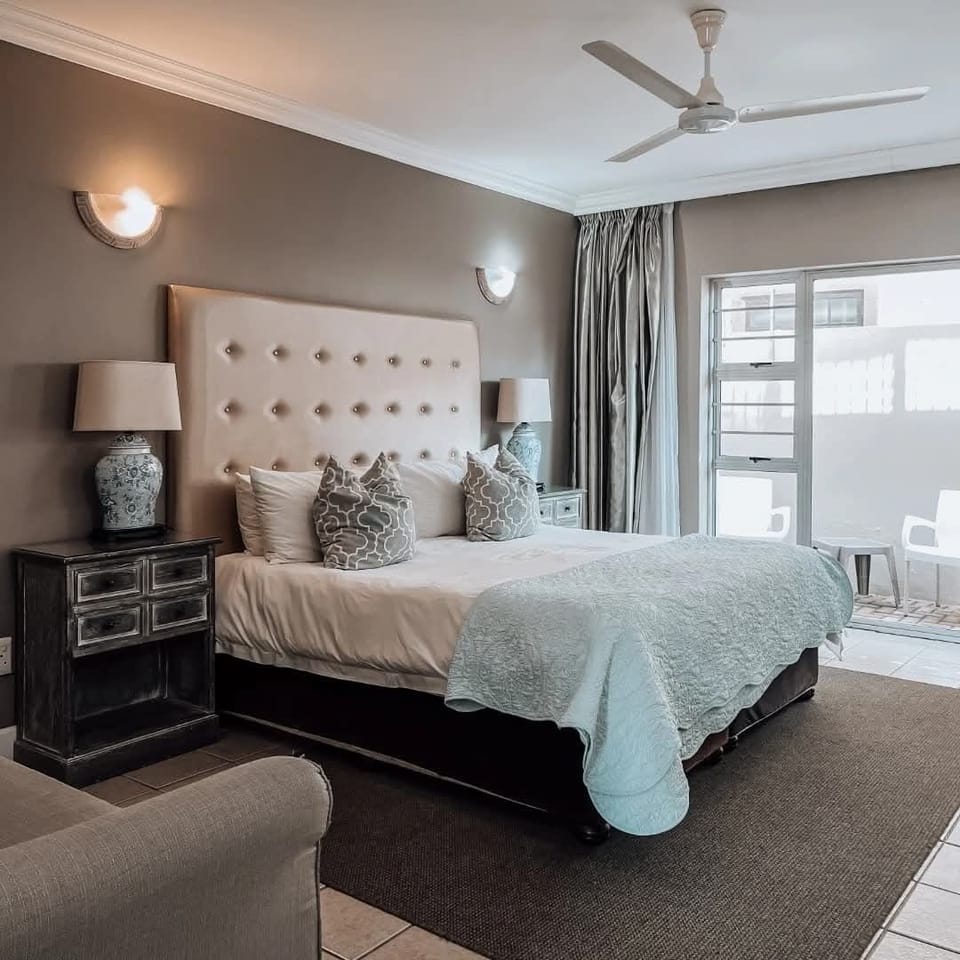 Family Room | Premium bedding, in-room safe, desk, iron/ironing board