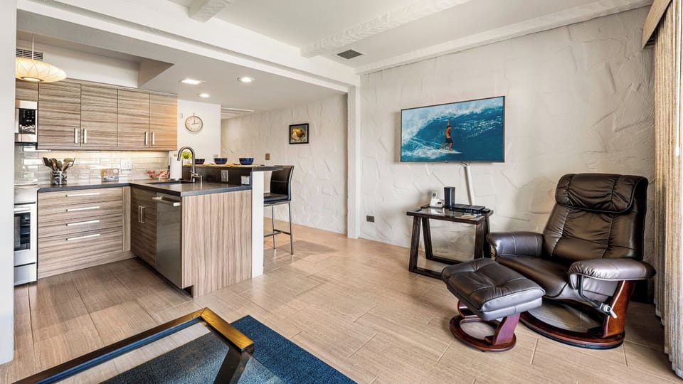 Condo, 1 King Bed, Lanai, Partial Ocean View (Casa de Emdeko 304) | Living area | 50-inch flat-screen TV with digital channels