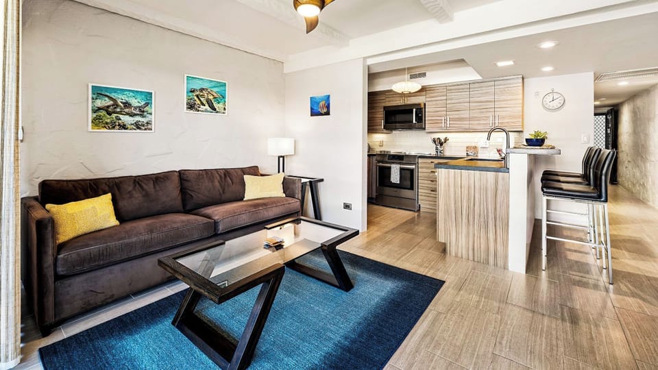 Condo, 1 King Bed, Lanai, Partial Ocean View (Casa de Emdeko 304) | Living area | 50-inch flat-screen TV with digital channels