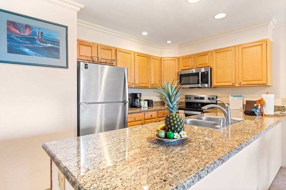 Condo, 1 King Bed with Sofa bed, Lanai, Ocean View (Sea Village 2102) | Private kitchen | Dining tables