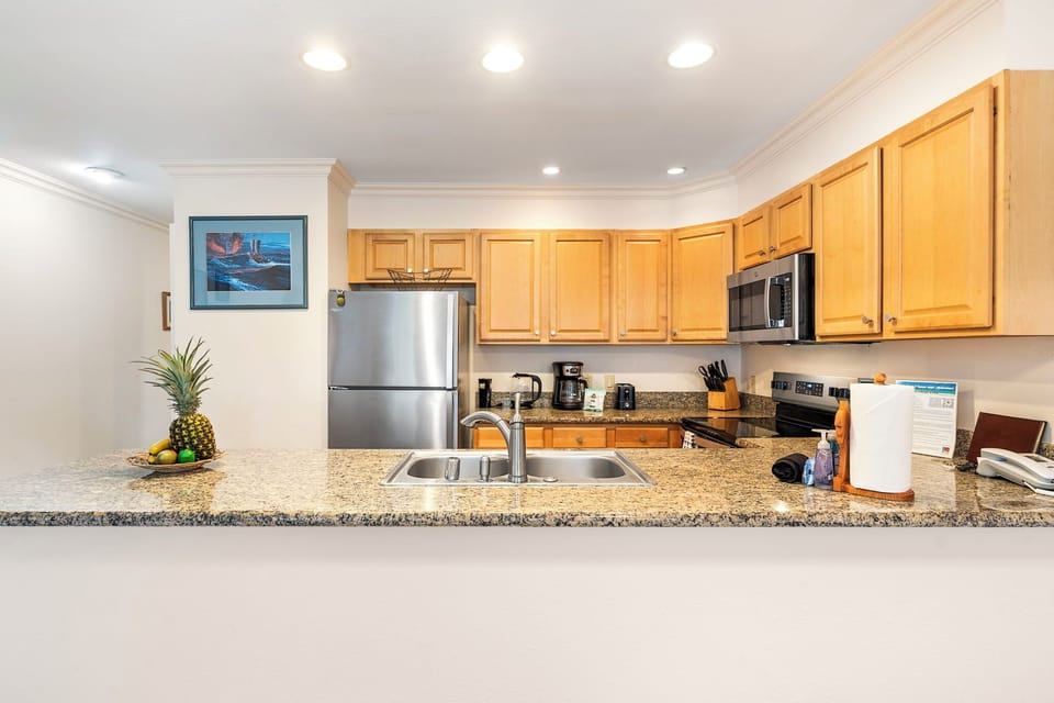 Condo, 1 King Bed with Sofa bed, Lanai, Ocean View (Sea Village 2102) | Private kitchen | Dining tables