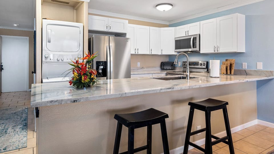 Condo, Multiple Beds, Lanai, Ocean View (Sea Village 3306) | Private kitchen | Dining tables