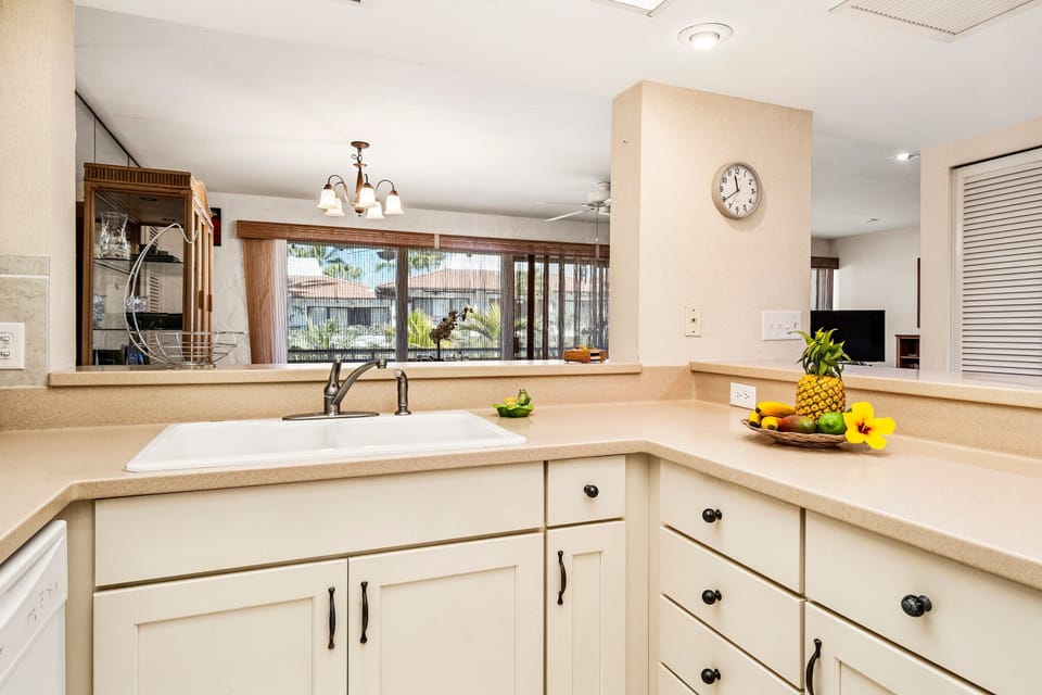 Condo, Multiple Beds, Lanai, Partial Ocean View (Casa de Emdeko 311) | Private kitchen | Dining tables