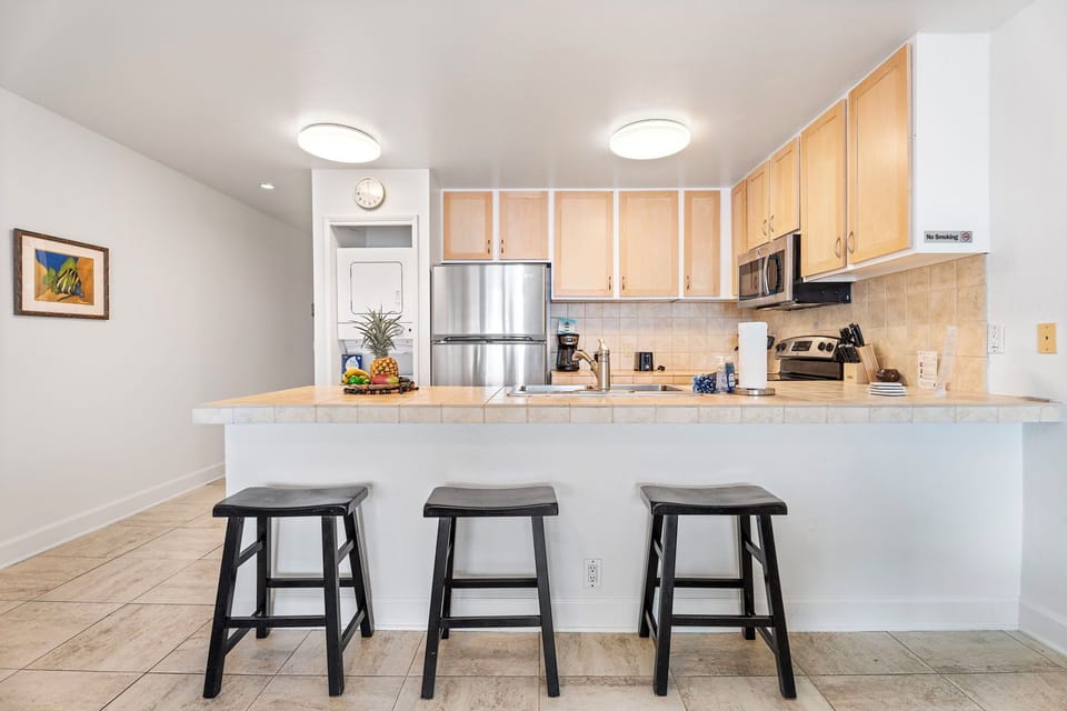 Condo, Multiple Beds, Lanai, Ocean View (Sea Village 4307) | Private kitchen | Dining tables