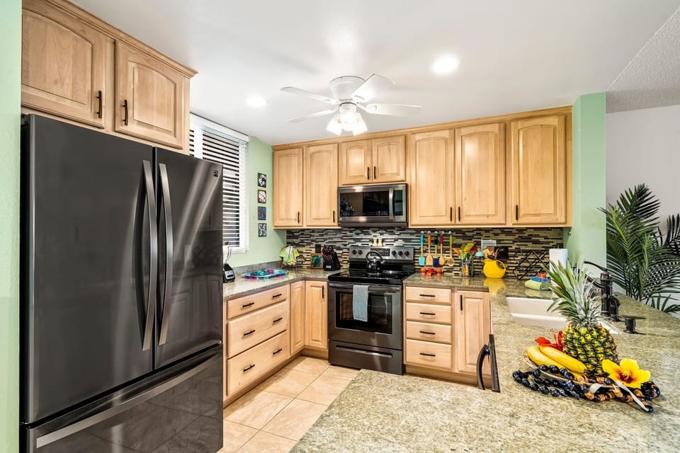 Condo, Multiple Beds, Lanai, Ocean View (Surf and Racquet 4203) | Private kitchen | Coffee/tea maker, dining table