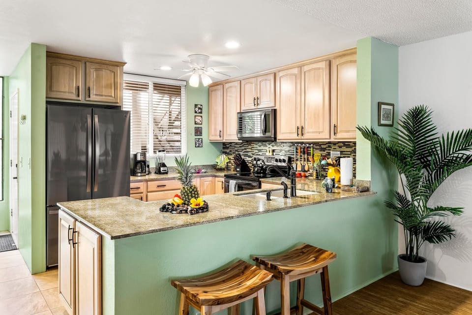 Condo, Multiple Beds, Lanai, Ocean View (Surf and Racquet 4203) | Private kitchen | Coffee/tea maker, dining table