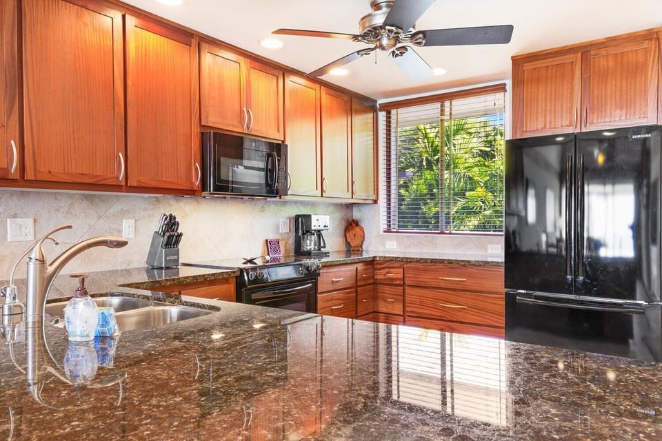 Condo, Multiple Beds, Balcony, Ocean View (Country Club Villas 302) | Private kitchen | Dining table