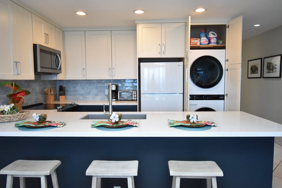 Condo, 1 King Bed with Sofa bed, Lanai, Ocean View (Sea Village 4104) | Private kitchen | Coffee/tea maker, dining tables