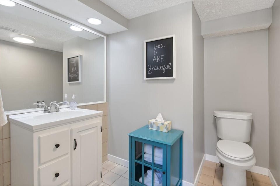 Secondary private ensuite bathroom with shower 