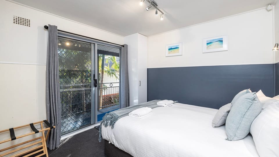 sandy POint Escape | Bedroom 2 | Splittable Queen Bed | 2 singles on request