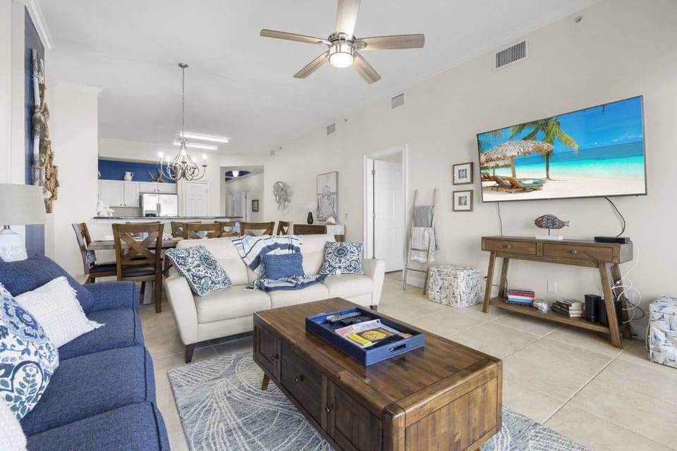 Newly Furnished Living Room with Sleeper Sofa, Loveseat, and Big Screen Smart TV