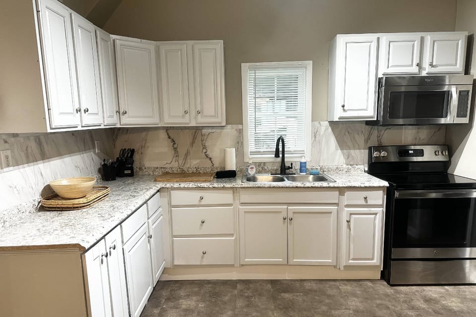 Kitchen is on the older side and has not been renovated but is fully stocked with everything you will need.