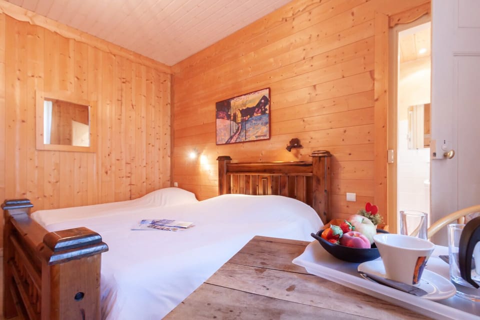 Superior Triple Room, Garden View | In-room safe, desk, laptop workspace, free WiFi