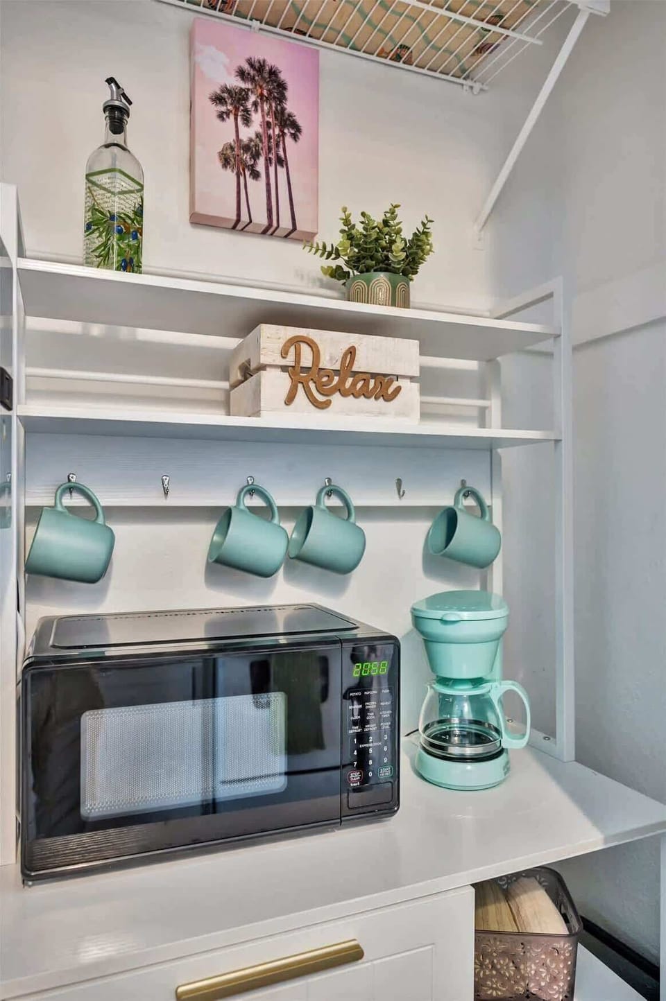 Snack central! Microwave for treats, coffee maker for fuel. You're all set!