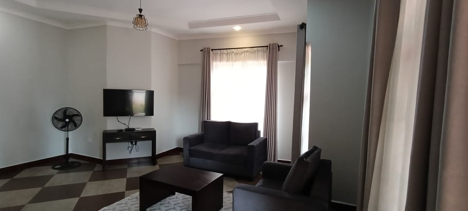 Family Apartment, Balcony, Garden View | Living area