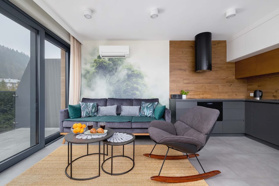 Living room with a comfortable sofa and TV. 