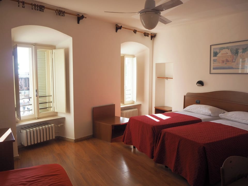 Standard Triple Room, City View | Desk, free WiFi, bed sheets