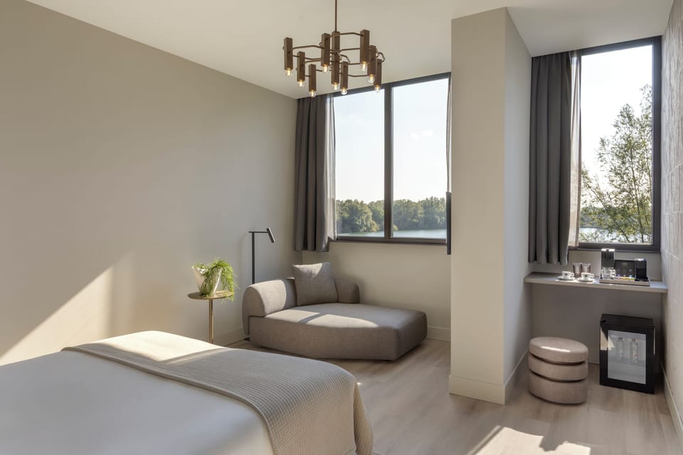 Junior Suite, Lake View | Memory foam beds, free minibar items, in-room safe, desk