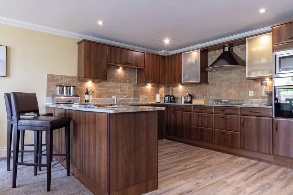 Superior Apartment, Golf View | Private kitchen | Full-size fridge, microwave, oven, stovetop