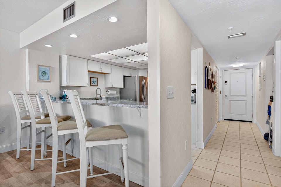 “Bright, functional kitchen—perfect for your beach getaway meals.”