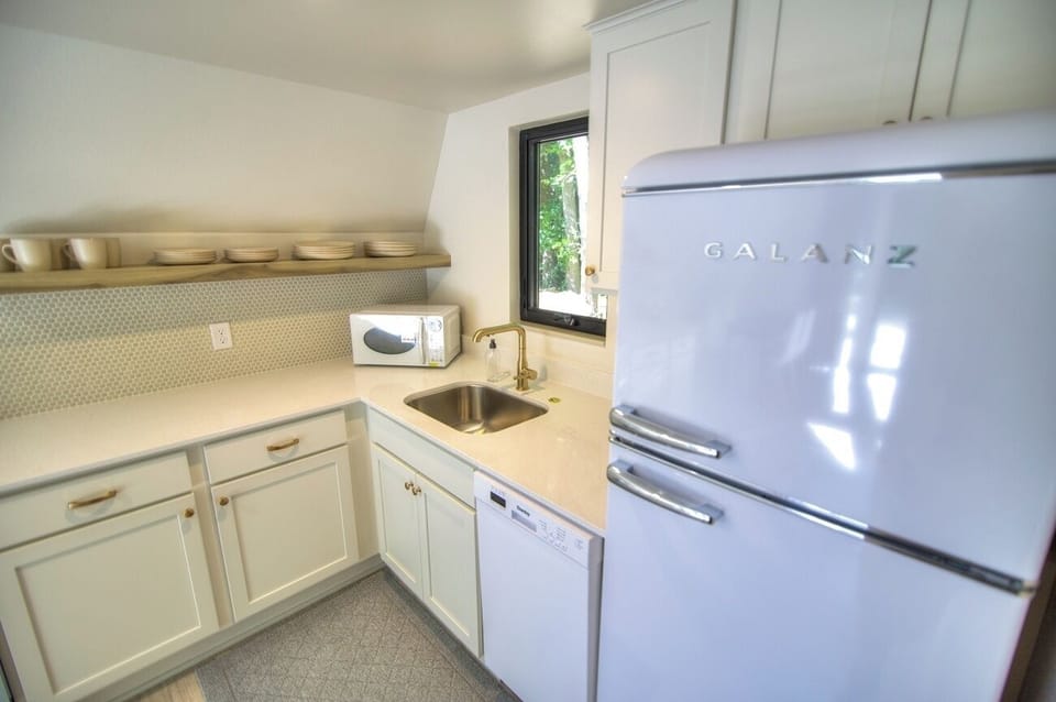 Cook with ease in a bright kitchen with modern touches.