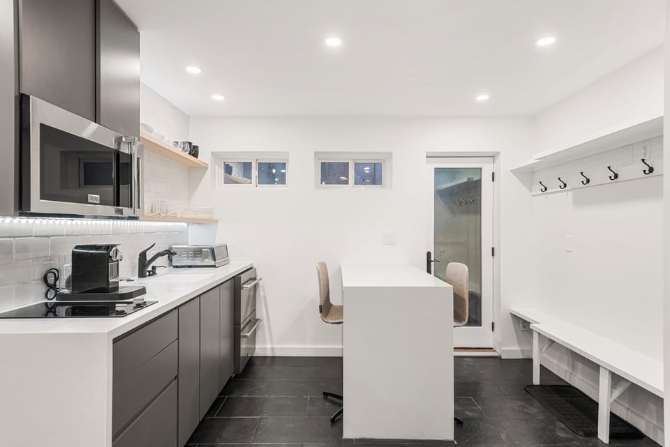 Kitchen and entryway. Plenty of storage for winter clothes and shoes