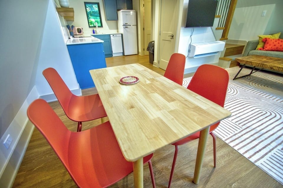 Share meals at the table steps from the stocked kitchen.